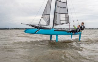 A foiling catamaran. Coaching from Windsport